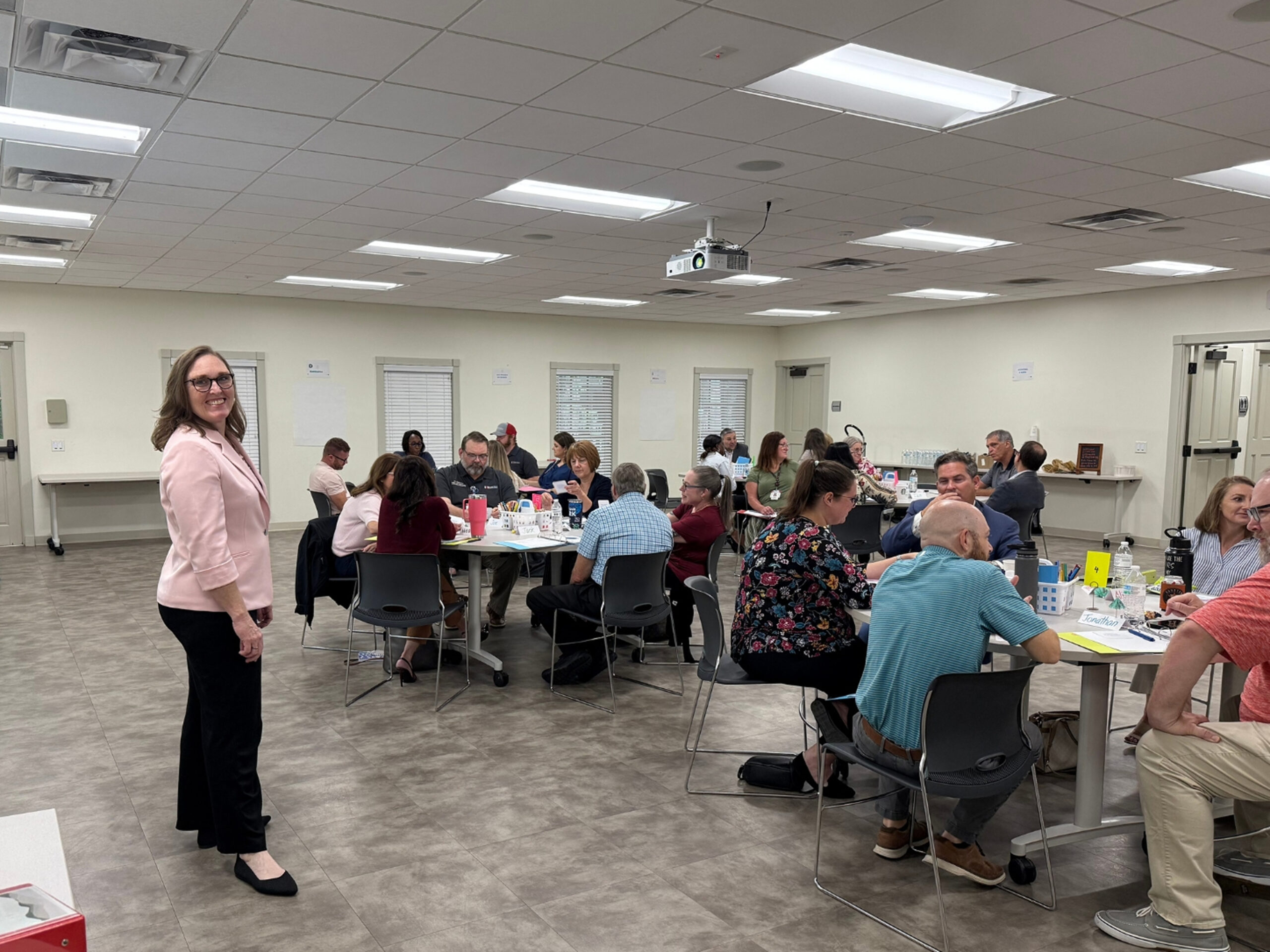 Leaders participating in a facilitated workshop during a hospital leadership engagement.